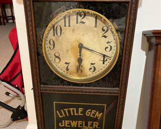 Antique clock by Wm. L. Gilbert advertising.”Little Gem Jeweler” in Chicago, IL.