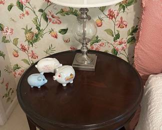 One of two matching round side tables.