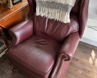 Burgundy leather wingback recliner by Hancock & Moore.