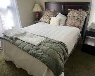 Queen bed with mattress and box.