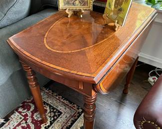 Drop-leaf side table by Baker Furniture.