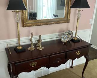 Sideboard by American Drew; Gold-framed mirror an ornate carved frame.
