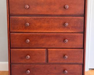 Tall wood dresser with custom fitted glass on top