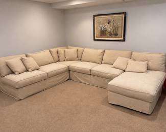 Slip covered sectional sofa with chaise by Rowe
