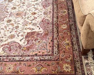 Handknotted 7‘7“ by 10‘4“ wool carpet