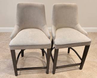 Two Arhaus upholstered counter stools