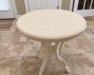 Ivory round pedestal accent table