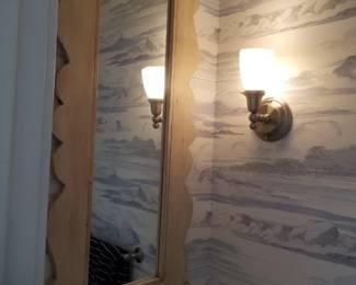 Wall mirror; light fixture