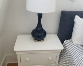 2-drawer nightstand; table lamp
