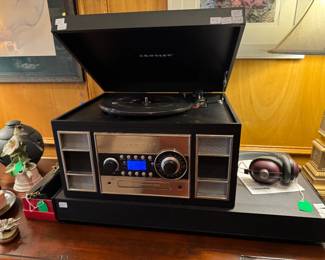 All in one stereo, turntable, cd, cassette and radio by Crosley