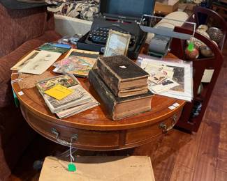 Round parlor tabl with leather inset with matching end table