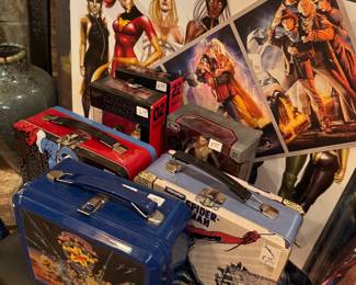 Collection of 80s lunch boxes, Adventurers, Spider Man, Captain Marvel and Power women poster