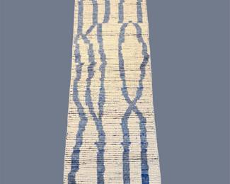 Ivory and blue contemporary rug with flowing abstract line pattern