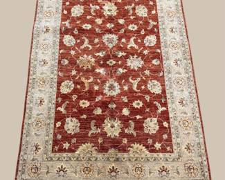 Red floral rug with repeating ivory botanical pattern