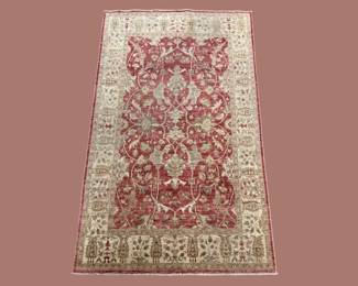 Soft rose and ivory traditional rug with intricate floral pattern