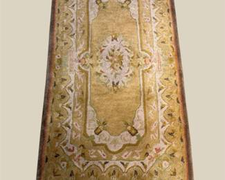 Golden traditional rug with elegant central medallion
