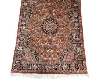 Warm brown traditional rug with intricate all-over medallion pattern