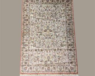 Ivory rug with intricate repeating all-over pattern