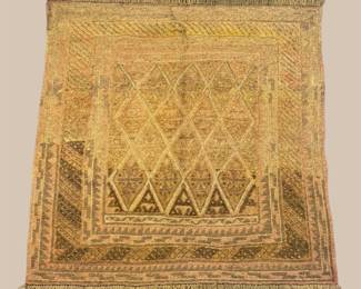Golden yellow rug with subtle geometric detailing