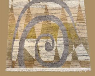 Neutral contemporary rug with large abstract circular design