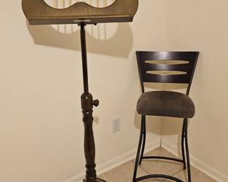 elegant note stand and several foldable chairs, great for playing guitar