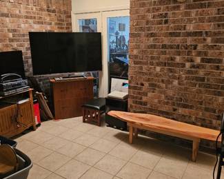 Flatscreens, cabinets and an awesome bench