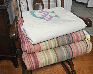 Rocket with bedspread and quilts