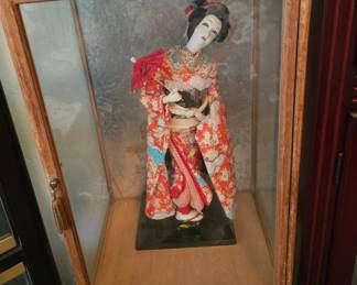 Ashian Geisha in display case, several
