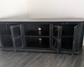 Media cabinet doors open