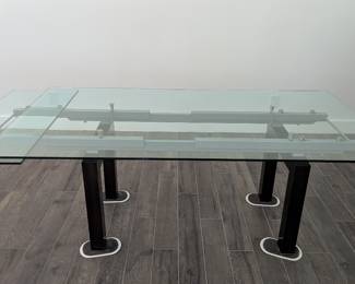 Copenhagen glass table with 1 extendable leaf , 3/8" thick glass, base table is 78 5/8" L x 41 3/4" W