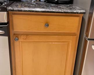Bottom Cabinet between Fridge and Stove 24" wide, 36" tall x 25" deep