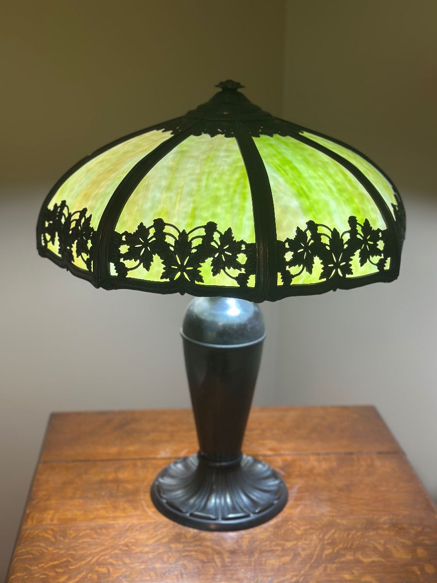 slag glass table lamp with a cast metal floral overlay,green marbled glass