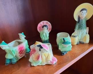 Vintage Shawnee Pottery Oriental-themed figural planters and figures