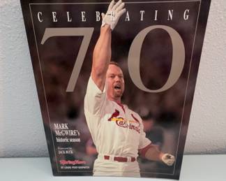 1998 commemorative book Celebrating 70: Mark McGwire's Historic Season— signed by Jack Buck
