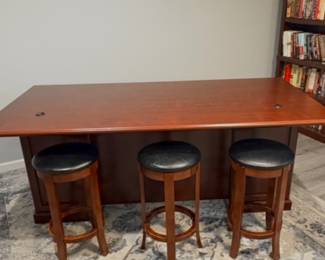 Front side of desk comes with 3 stools