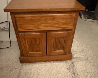 Small side table. One drawer, and one cupboard space.