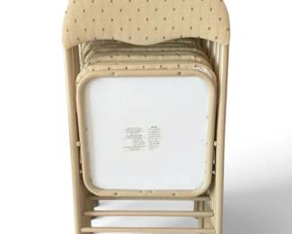 Eight Tan Folding Chairs w Embroidered Design