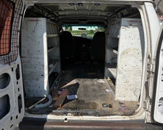 2001 Ford E-250 Cargo / Work Van Previously used as an electrical service van. Includes interior metal shelving/storage and heavy-duty ladder rack. Aftermarket touchscreen stereo. Van starts, runs and drives, but engine is going bad and vehicle runs/drives slowly. Mechanical work will be needed. IMPORTANT: Title is currently missing/unavailable. Vehicle is being sold as-is.