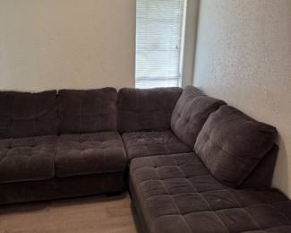 Large Charcoal L-Shaped Sectional – 122” x 86” Description: Comfortable charcoal gray sectional sofa in good condition. Large enough for the whole family and perfect for a living room or media room. Dimensions: Approximately 122” × 86” Cushions are removable. Smoke-free home. Some normal wear from use. Pickup only. Buyer must bring help to load.