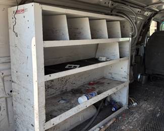 2001 Ford E-250 Cargo / Work Van Previously used as an electrical service van. Includes interior metal shelving/storage and heavy-duty ladder rack. Aftermarket touchscreen stereo. Van starts, runs and drives, but engine is going bad and vehicle runs/drives slowly. Mechanical work will be needed. IMPORTANT: Title is currently missing/unavailable. Vehicle is being sold as-is.