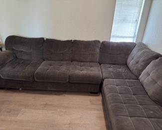 Large Charcoal L-Shaped Sectional – 122” x 86” Description: Comfortable charcoal gray sectional sofa in good condition. Large enough for the whole family and perfect for a living room or media room. Dimensions: Approximately 122” × 86” Cushions are removable. Smoke-free home. Some normal wear from use. Pickup only. Buyer must bring help to load.