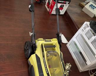 Ryobi 40V HP Brushless 20” Cordless Lawn Mower Ryobi 40V HP Brushless 20-inch cordless lawn mower. Battery-powered with a brushless motor and 20” cutting deck. Includes 40V battery and charger. Grass collection bag included. Used condition.
