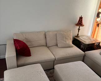 Cream Modular Sectional with 3 Ottomans – 9.5’ x 6.5’ Description: Beautiful cream modular sectional sofa with three matching ottomans. Comfortable, modern design that can be arranged in multiple configurations to fit your space. Dimensions: * Long side: 9.5 ft (114”) * Short side: 6.5 ft (78”) Includes: * Modular sectional * 3 matching ottomans Good condition. Smoke-free home. Perfect for a living room, family room, or media room.