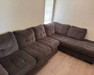 Large Charcoal L-Shaped Sectional – 122” x 86” Description: Comfortable charcoal gray sectional sofa in good condition. Large enough for the whole family and perfect for a living room or media room. Dimensions: Approximately 122” × 86” Cushions are removable. Smoke-free home. Some normal wear from use. Pickup only. Buyer must bring help to load.