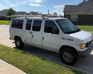 2001 Ford E-250 Cargo / Work Van Previously used as an electrical service van. Includes interior metal shelving/storage and heavy-duty ladder rack. Aftermarket touchscreen stereo. Van starts, runs and drives, but engine is going bad and vehicle runs/drives slowly. Mechanical work will be needed. IMPORTANT: Title is currently missing/unavailable. Vehicle is being sold as-is.