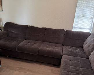 Large Charcoal L-Shaped Sectional – 122” x 86” Description: Comfortable charcoal gray sectional sofa in good condition. Large enough for the whole family and perfect for a living room or media room. Dimensions: Approximately 122” × 86” Cushions are removable. Smoke-free home. Some normal wear from use. Pickup only. Buyer must bring help to load.