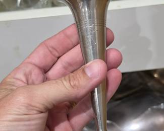 Sterling weighted silver bud vase by Sterling, Reinhold, and embossed. Elegant vintage sterling silver floral vase with classic trumpet design, perfect for collectors, home décor, or displaying fresh flowers. Available at the Kinfolk Estate Sale in Tavares, Florida.