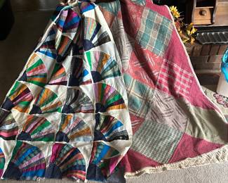 handmade quilt and quilt topper.