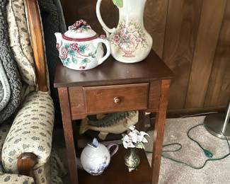 end table , collection of pitchers