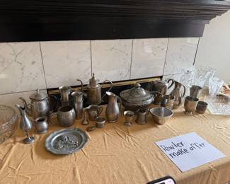 Large collection of pewter serving pieces, crystal & glassware